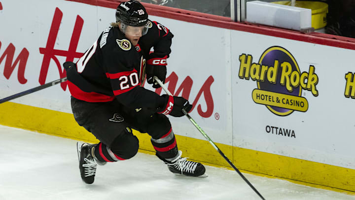 Apr 17, 2025; Ottawa, Ontario, CAN; Ottawa Senators left wing Fabian Zetterlund (20) moves the puck in the third period against the Carolina Hurricanes at the Canadian Tire Centre. Mandatory Credit: Marc DesRosiers-Imagn Images Apr 17, 2025; Ottawa, Ontario, CAN; Ottawa Senators left wing Fabian Zetterlund (20) moves the puck in the third period against the Carolina Hurricanes at the Canadian Tire Centre. Mandatory Credit: Marc DesRosiers-Imagn Images