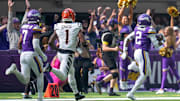 Vikings cornerback Isaiah Rodgers returns an interception for a touchdown, the first of this two scores in the Vikings' 48-10 rout of the Bengals.