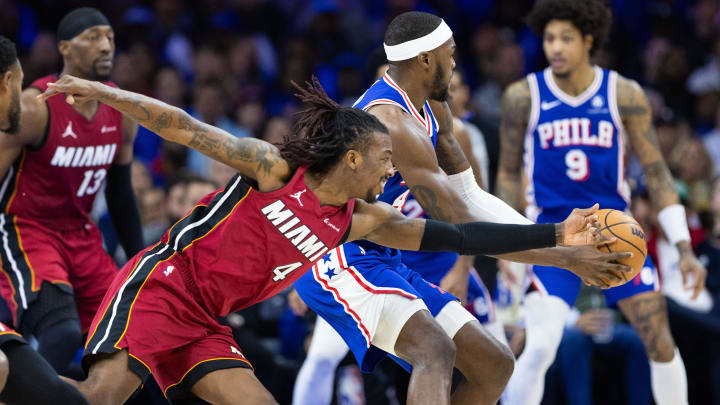 Philadelphia 76ers forward Paul Reed (44) controls a loose ball against Miami Heat guard Delon Wright (4) during the second quarter of a play-in game of the 2024 NBA playoffs at Wells Fargo Center. 