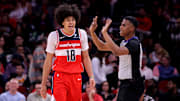 Nov 12, 2025; Houston, Texas, USA; Washington Wizards forward Kyshawn George (18) reacts after a foul call against the Houston Rockets during the game at Toyota Center. Mandatory Credit: Erik Williams-Imagn Images