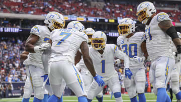 Oct 2, 2022; Houston, Texas, USA; Los Angeles Chargers tight end Gerald Everett (7) celebrates with