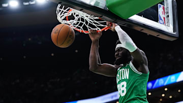 Apr 12, 2024; Boston, Massachusetts, USA; Boston Celtics center Neemias Queta (88) makes the basket against the Charlotte Hornets in the second quarter at TD Garden. Mandatory Credit: David Butler II-Imagn Images