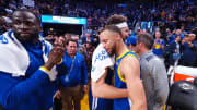 Mar 14, 2022; San Francisco, California, USA; Golden State Warriors guard Stephen Curry (30) hugs guard Klay Thompson (11) with Golden State Warriors forward Draymond Green (23) after the game against the Washington Wizards at Chase Center. Mandatory Credit: Kelley L Cox-USA TODAY Sports