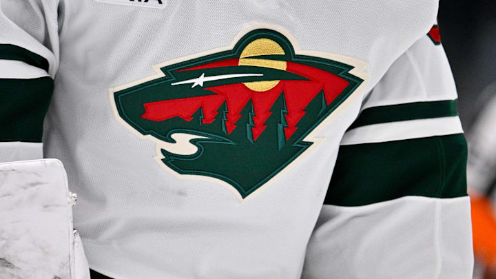 Oct 14, 2025; Dallas, Texas, USA; A view of the Minnesota Wild logo during the game between the Dallas Stars and the Minnesota Wild at American Airlines Center. Oct 14, 2025; Dallas, Texas, USA; A view of the Minnesota Wild logo during the game between the Dallas Stars and the Minnesota Wild at American Airlines Center.