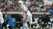 Dec 7, 2025; Jacksonville, Florida, USA;  Indianapolis Colts quarterback Daniel Jones (17)  rolls out against the Jacksonville Jaguars during the first half at EverBank Stadium. Mandatory Credit: Matt Pendleton-Imagn Images