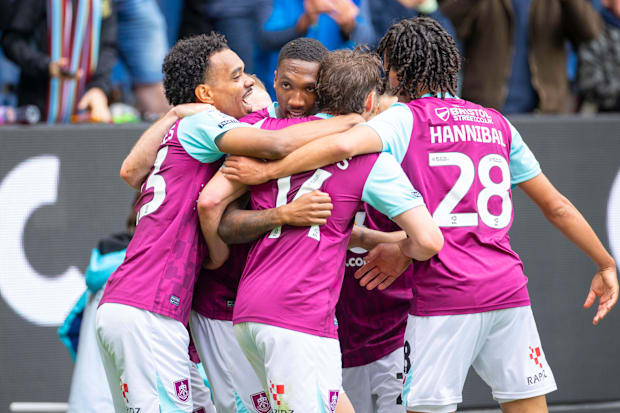 Burnley players celebrate.