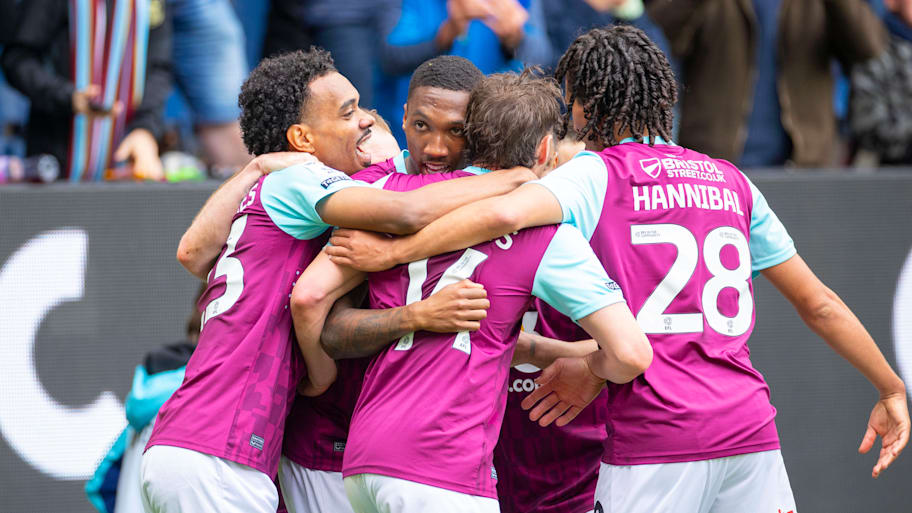 Burnley players celebrate.