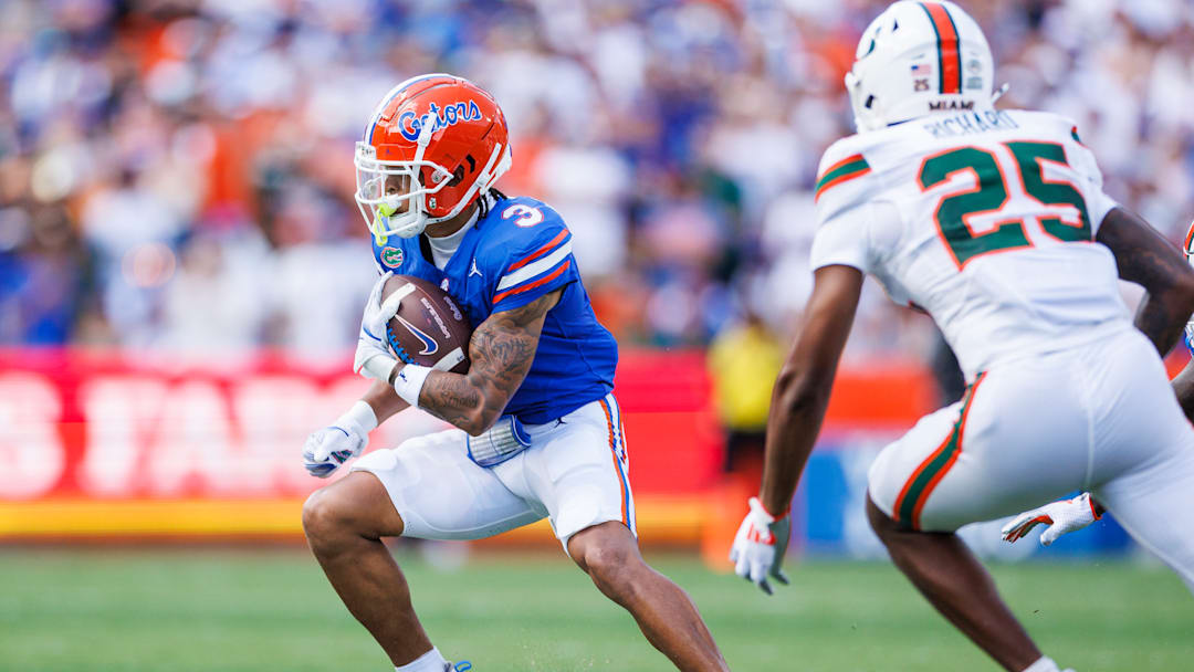 Eugene Wilson III runs with the ball during Florida's loss to Miami.