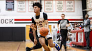 The Rock National Lions guard Joseph Hartman (10) drives to the basket against the FSUS Seminoles during the first half at The Rock School in Gainesville, FL on Friday, January 19, 2024. [Matt Pendleton/Gainesville Sun]