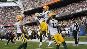 Nov 17, 2024; Chicago, Illinois, USA; Green Bay Packers running back Josh Jacobs (8) celebrates his touchdown against the Chicago Bears during the second half at Soldier Field. Mandatory Credit: David Banks-Imagn Images