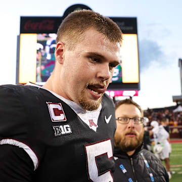 Nov 1, 2025; Minneapolis, Minnesota, USA; Minnesota Golden Gophers quarterback Drake Lindsey (5) celebrates his teams overtime win against the Michigan State Spartans at Huntington Bank Stadium. Mandatory Credit: Matt Krohn-Imagn Images
