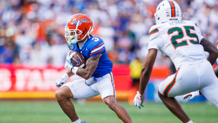 Eugene Wilson III runs with the ball during Florida's loss to Miami.