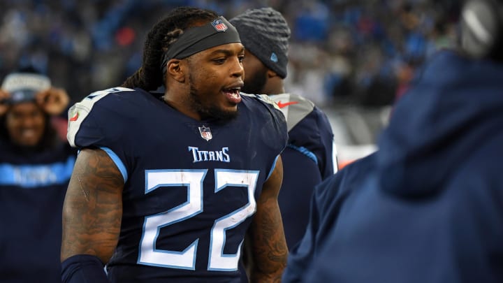 Dec 6, 2018; Nashville, TN, USA; Tennessee Titans running back Derrick Henry (22) celebrates on the sidelines after a 99-yard touchdown run during the first half against the Jacksonville Jaguars at Nissan Stadium. Mandatory Credit: Christopher Hanewinckel-USA TODAY Sports