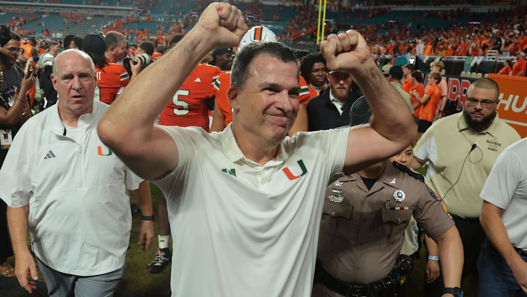 Aug 31, 2025; Miami Gardens, Florida, USA; Miami Hurricanes head coach Mario Cristobal reacts after defeating the Notre Dame Fighting Irish at Hard Rock Stadium. Mandatory Credit: Sam Navarro-Imagn Images