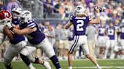Dec 26, 2024; Phoenix, AZ, USA; Kansas State Wildcats quarterback Avery Johnson (2) against the Rutgers Scarlet Knights during the Rate Bowl at Chase Field. Mandatory Credit: Mark J. Rebilas-Imagn Images