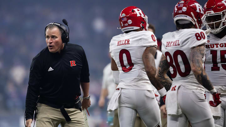 Dec 26, 2024; Phoenix, AZ, USA; Rutgers Scarlet Knights head coach Greg Schiano against the Kansas State Wildcats during the Rate Bowl at Chase Field. Mandatory Credit: Mark J. Rebilas-Imagn Images Dec 26, 2024; Phoenix, AZ, USA; Rutgers Scarlet Knights head coach Greg Schiano against the Kansas State Wildcats during the Rate Bowl at Chase Field. Mandatory Credit: Mark J. Rebilas-Imagn Images