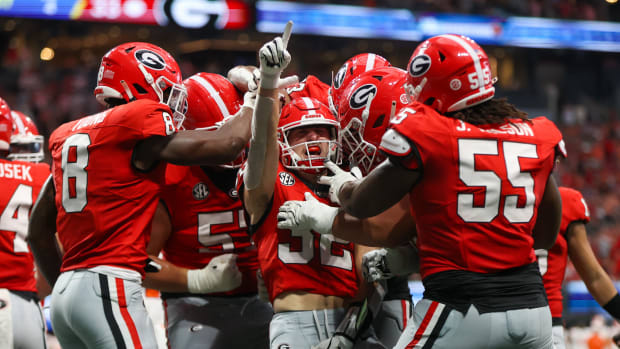 Aug 31, 2024; Atlanta, Georgia, USA; Georgia’s Cash Jones celebrates with teammates after a touchdown against Clemson.