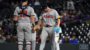 Apr 29, 2025; Denver, Colorado, USA; Atlanta Braves pitcher AJ Smith-Shawver (32) checks his arm after being hit by a line drive during the sixth inning against the Colorado Rockies at Coors Field. Mandatory Credit: Christopher Hanewinckel-Imagn Images