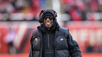 Nov 25, 2023; Salt Lake City, Utah, USA; Colorado Buffaloes head coach Deion 'Coach Prime' Sanders on the field against the Utah Utes at Rice-Eccles Stadium. Mandatory Credit: Christopher Creveling-Imagn Images