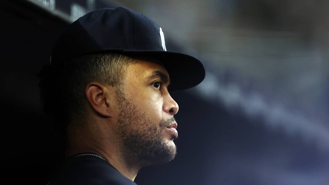 Giancarlo Stanton looking on during a Yankees + Mariners series