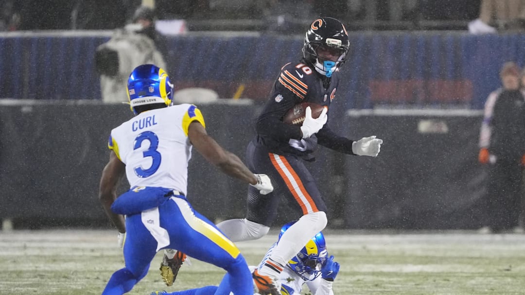 Jan 18, 2026; Chicago, IL, USA; Chicago Bears wide receiver Luther Burden III (10) runs after the catch against Los Angeles Rams cornerback Darious Williams (31) and safety Kam Curl (3) during the second quarter of an NFC Divisional Round game at Soldier Field. Mandatory Credit: David Banks-Imagn Images
