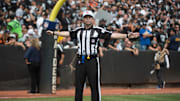 September 13, 2015; Oakland, CA, USA; NFL referee Brad Allen (122) during the first quarter between the Oakland Raiders and the Cincinnati Bengals at O.co Coliseum. The Bengals defeated the Raiders 33-13. Mandatory Credit: Kyle Terada-Imagn Images