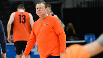 Mar 20, 2025; Milwaukee, WI, USA;  Illinois Fighting Illini head coach Brad Underwood watches during NCAA Tournament First Round Practiceat Fiserv Forum. Mandatory Credit: Benny Sieu-Imagn Images