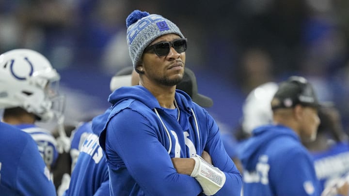 Dec 28, 2025; Indianapolis, Indiana, USA; Indianapolis Colts quarterback Anthony Richardson (5) watches the action on the field from the sidelin at Lucas Oil Stadium. Mandatory Credit: Grace Hollars-USA TODAY Network via Imagn Images