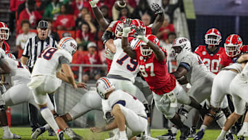 Sep 2, 2023; Athens, Georgia, USA; Georgia Bulldogs defensive lineman Warren Brinson (97) partially blocks a field goal attempt by Tennessee Martin Skyhawks place kicker Aidan Laros (48) during the second half at Sanford Stadium. Mandatory Credit: Dale Zanine-Imagn Images