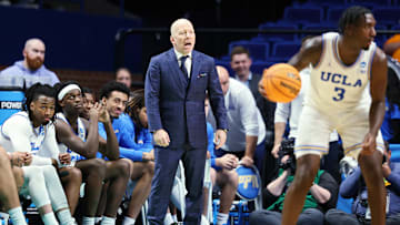 Mick Cronin coaches UCLA to a first-round victory over Utah State in the 2025 March Madness tournament.