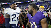 Henry and Ingram meet after a game between the Titans and Ravens