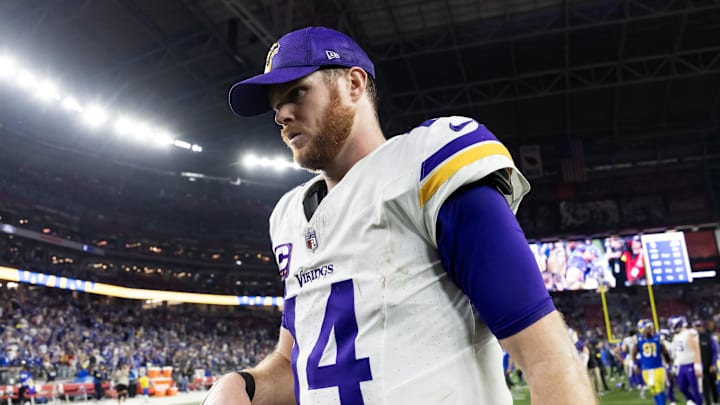 Minnesota Vikings quarterback Sam Darnold (14) reacts as he walks off the field after losing to the Los Angeles Rams 
