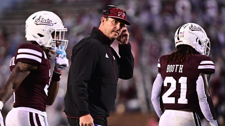 Mississippi State Bulldogs head coach Jeff Lebby speaks with players between plays against the Eastern Kentucky Colonels during the third quarter at Davis Wade Stadium at Scott Field.