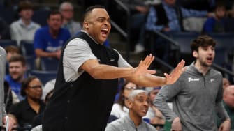 Feb 11, 2024; Memphis, Tennessee, USA; Tulane Green Wave head coach Ron Hunter reacts during the first half against the Memphis Tigers at FedExForum. 