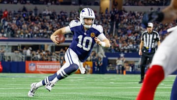 Nov 28, 2024; Arlington, Texas, USA; Dallas Cowboys quarterback Cooper Rush (10) runs for the end-zone during the second quarter against the New York Giants at AT&T Stadium. Mandatory Credit: Andrew Dieb-Imagn Images