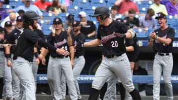 South Carolina batter Ethan Petry is congratulated by teammates after hitting a home run against LSU during the second round of the SEC Baseball Tournament at the Hoover Met Wednesday, May 24, 2023.