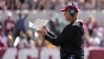 Oct 12, 2024; Tuscaloosa, Alabama, USA;  Alabama Crimson Tide head coach Kalen DeBoer signals to his players at Bryant-Denny Stadium. Alabama defeated South Carolina 27-25. Mandatory Credit: Gary Cosby Jr.-Imagn Images