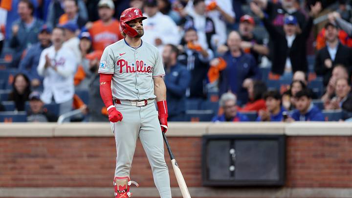 Bryce Harper stands frustrated after an at-bat against the Mets