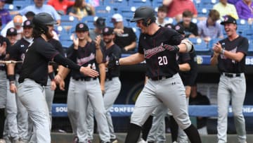 South Carolina batter Ethan Petry is congratulated by teammates after hitting a home run against the LSU Tigers in the 2023 SEC Baseball Tournament