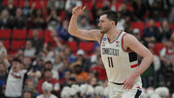 Mar 21, 2025; Raleigh, NC, USA;  Connecticut Huskies forward Alex Karaban (11) reacts during the second half against the Oklahoma Sooners at Lenovo Center.