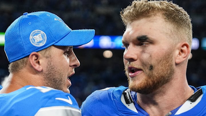 Detroit Lions quarterback Jared Goff (16) celebrates 26-20 win over Los Angeles Rams with Aidan Hutchinson