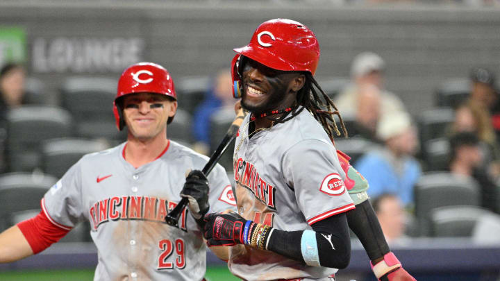 Aug 21, 2024; Toronto, Ontario, CAN;  Cincinnati Reds shortstop Elly De La Cruz (44) is greeted at home plate by center fielder TJ Friedl (29) after hitting a solo home run against the Toronto Blue Jays in the eighth inning at Rogers Centre. Mandatory Credit: Dan Hamilton-USA TODAY Sports