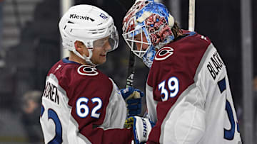 Dec 7, 2025; Philadelphia, Pennsylvania, USA; Colorado Avalanche left wing Artturi Lehkonen (62) and goaltender Mackenzie Blackwood (39) celebrate win against the Philadelphia Flyers during the third period at Xfinity Mobile Arena. Mandatory Credit: Eric Hartline-Imagn Images