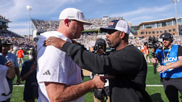 Atlanta, Georgia, USA; Georgia Tech Yellow Jackets head coach Brent Key talks to Syracuse Orange head coach Fran Brown after a game at Bobby Dodd Stadium at Hyundai Field.