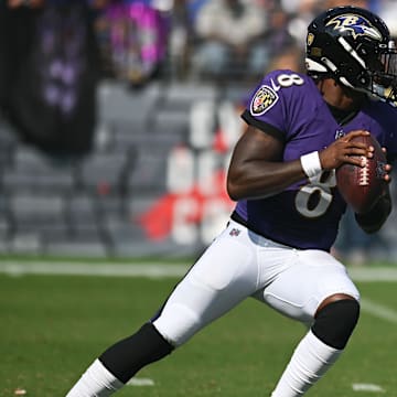 Sep 18, 2022; Baltimore, Maryland, USA;  Baltimore Ravens quarterback Lamar Jackson (8) looks to throw during the second half against the Miami Dolphins at M&T Bank Stadium. Mandatory Credit: Tommy Gilligan-Imagn Images