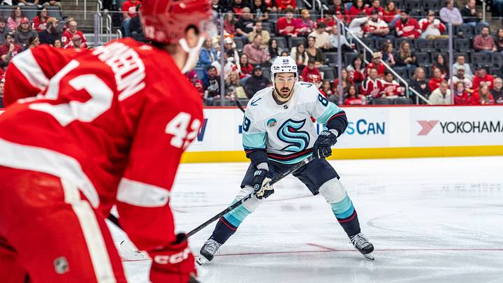 Oct 9, 2026; Detroit, Michigan, USA;  Seattle Kraken center Frederick Gaudreau (89) applies pressure against the Detroit Red Wings in the third period at Little Caesars Arena.  Mandatory Credit: Paul Barnick-Imagn Images