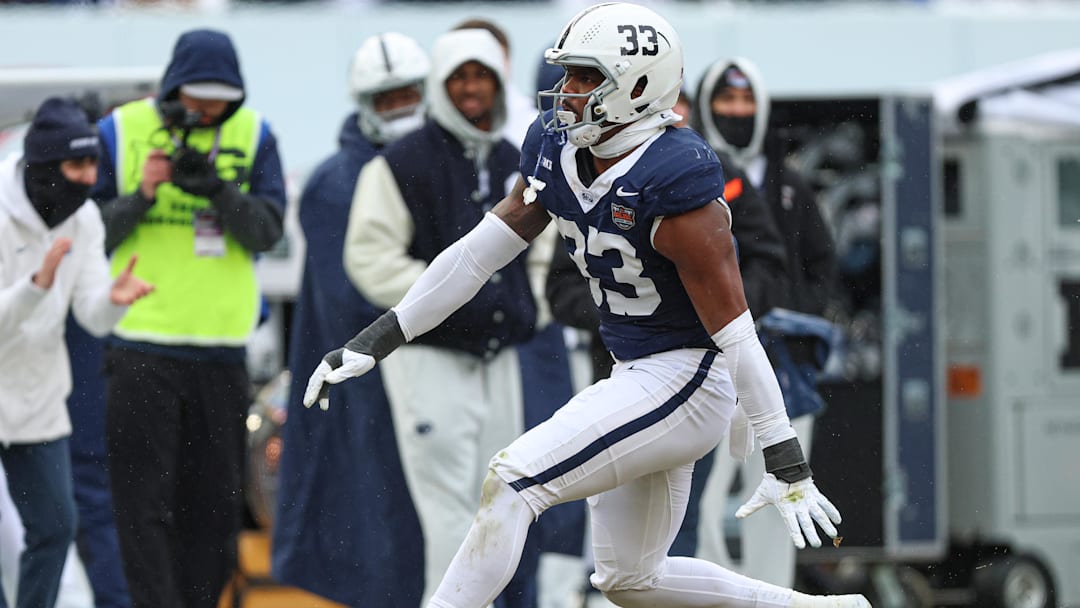 Penn State Nittany Lions defensive end Dani Dennis-Sutton (33) celebrates after a sack during the first half of the 2025 Pinstripe Bowl against the Clemson Tigers at Yankee Stadium. 