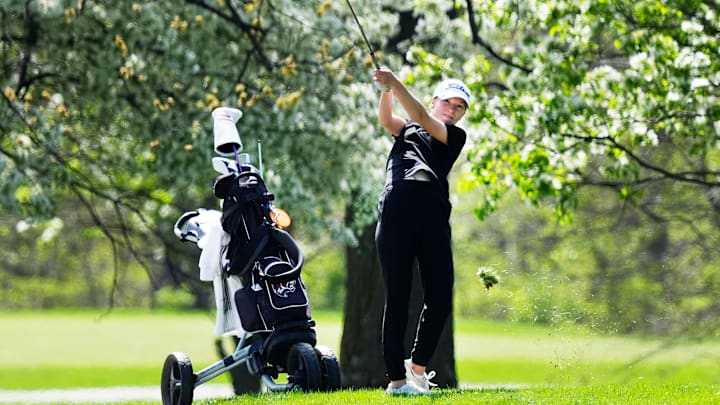 Gilbert’s Ella Lohrbach looks at the ball after a drive the ball from rough onto the fourth hole in the Turk Bowman Invitational Girls Golf tournament at Veenker Golf Course in Ames.