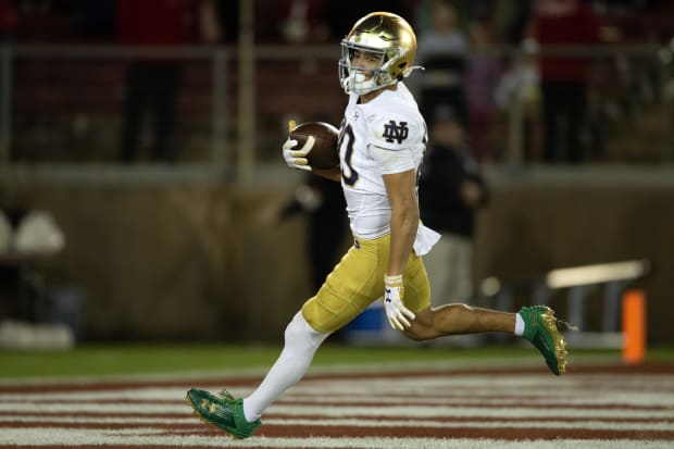 Notre Dame Fighting Irish wide receiver Jordan Faison scores a touchdown.