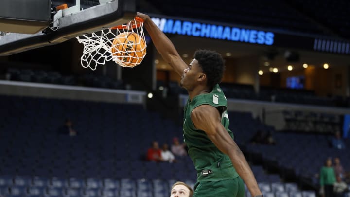 Mar 21, 2024; Memphis, TN, USA; Baylor Bears center Yves Missi (21) dunks during practice for the NCAA Tournament First Round at FedExForum.